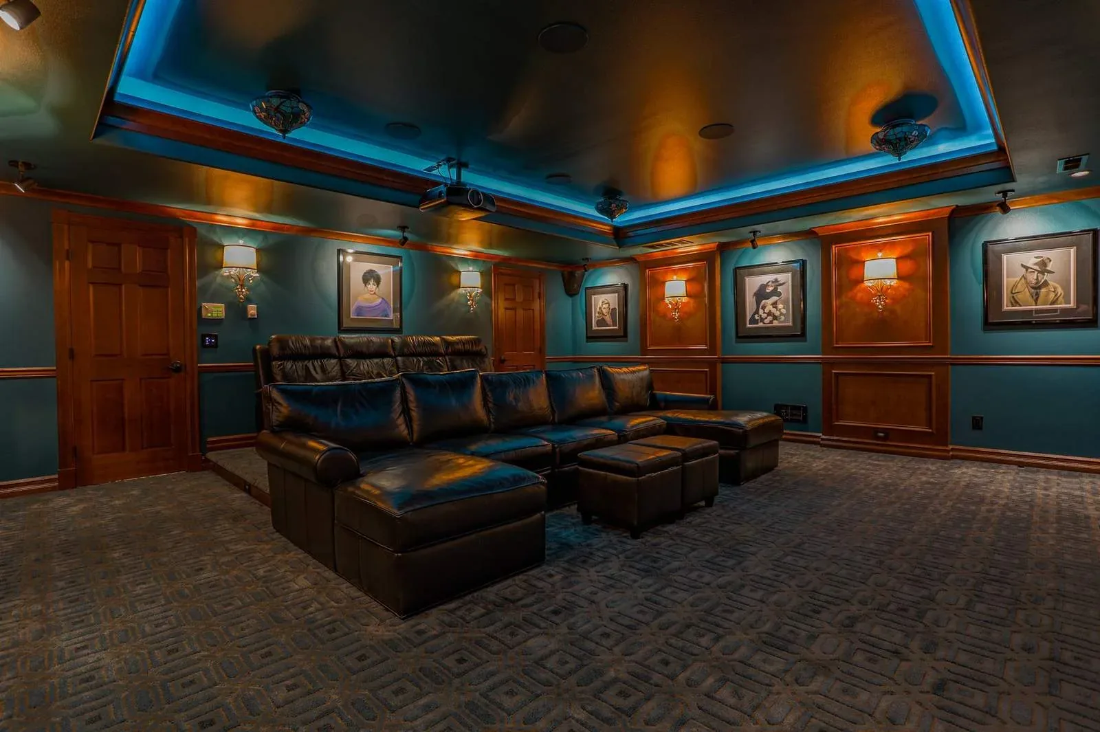 Home theater seating with blue cove lighting, Marysville
