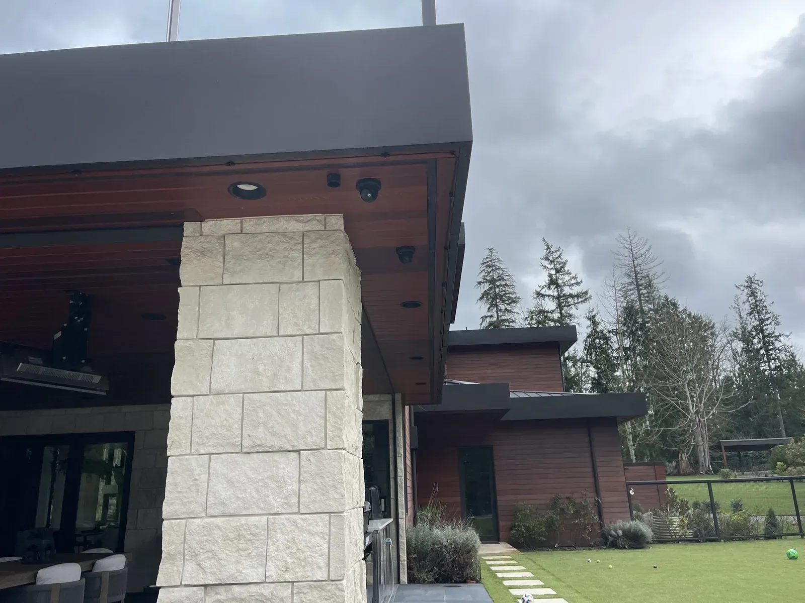 Home exterior with security cameras under the eaves, Redmond